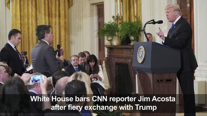 White House bars CNN reporter after Trump exchange