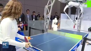 Man vs Machine table tennis showdown at China's first import expo in Shanghai.#CIIE