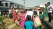 Train passengers fight to get into incredibly crowded train in India