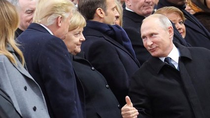 Watch: Putin's warm thumbs-up to Trump at Paris commemorations