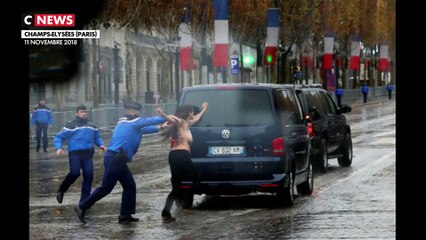 11 Novembre : Trois Femen forcent la sécurité devant le passage de Donald Trump