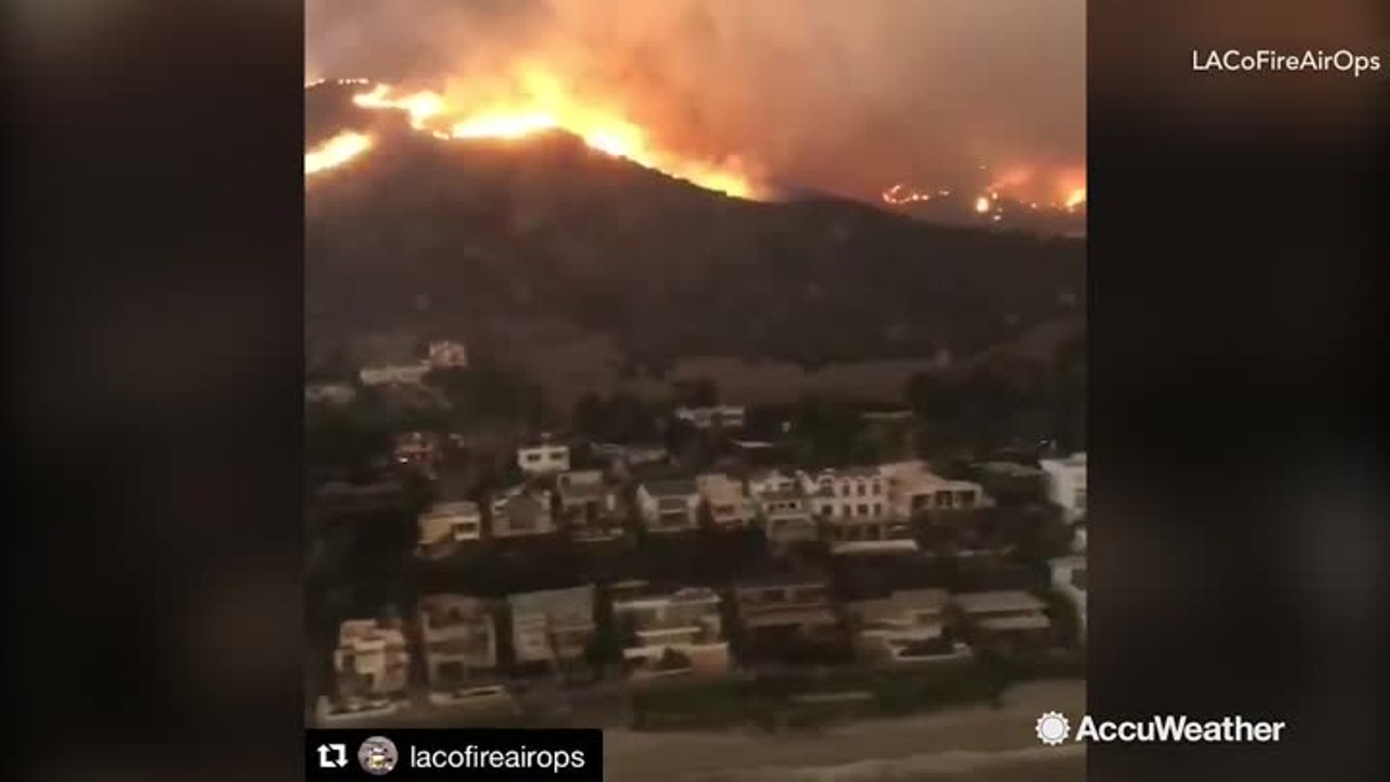 Frightening scene with hills engulfed in flames