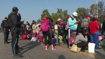 Migrants in caravan heading to US consider their options