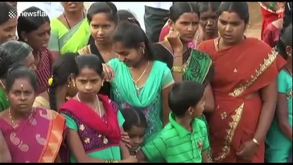 Indian villagers throw dung at each other for good luck in smelly festival