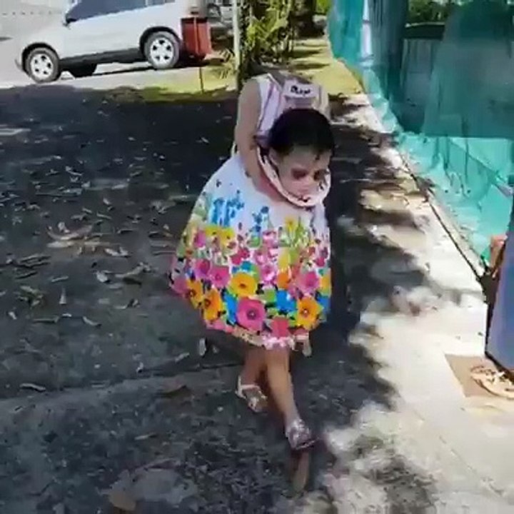 Child with head in the hands