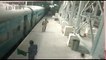Hero cop saves woman from slipping under moving train