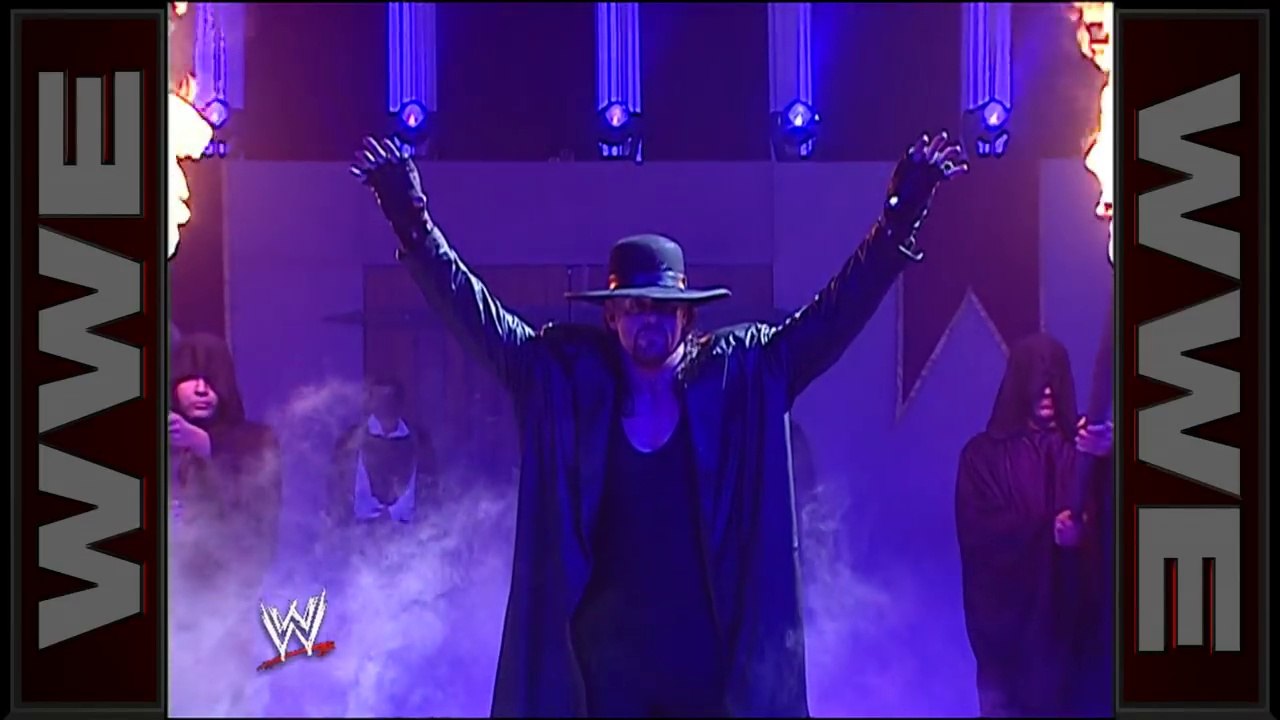 The Undertaker uses his powers to destroy the ring while Kurt Angle is in it- Royal Rumble