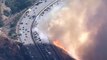 Les images d'un hélicoptère qui largue de l'eau sur une autoroute au bord des flammes (Californie)... Incroyable