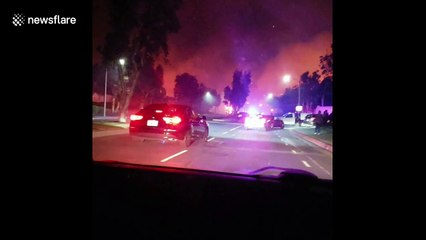 Footage shows residents evacuating from fast-moving Sierra Fire