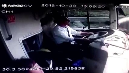 Dashcam shows bus windscreen getting smashed by flying piece of wood