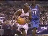 NBA BASKETBALL - Michael Jordan dunks on Tim Duncan