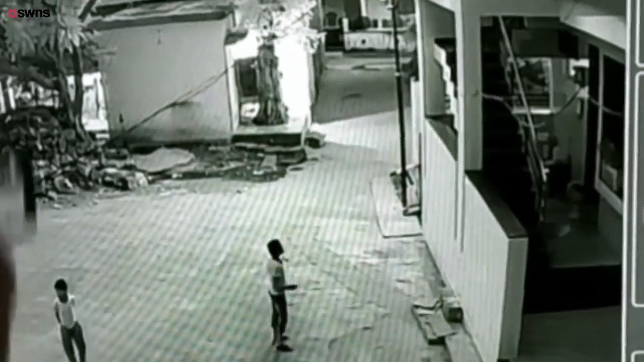Boy miraculously survives 40ft plunge from rooftop after landing on friend