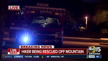 Hiker being rescued off mountain