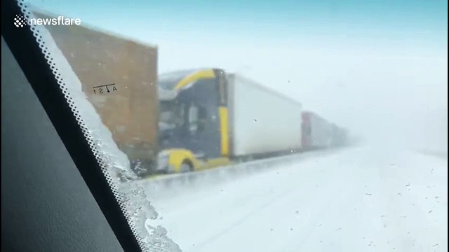 Driver narrowly escapes being hit by massive explosion from car pileup on Russian highway