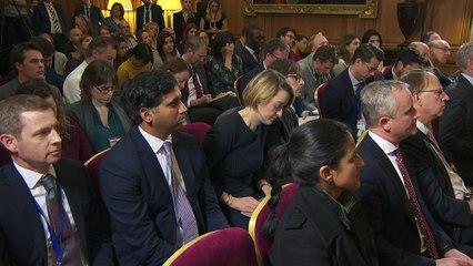 Defiant May insists she will see the Brexit plan through