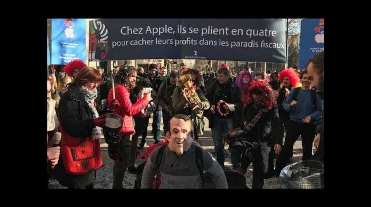 Attac est venue "fêter" l'inauguration du Apple Store sur les Champs-Élysées