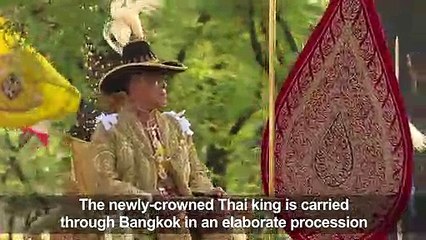 Newly-crowned Thai king carried in elaborate royal procession