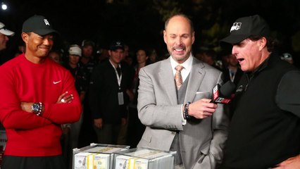 미켈슨, '세기의 대결' 우즈 꺾고 상금 900만 달러 품에 / YTN