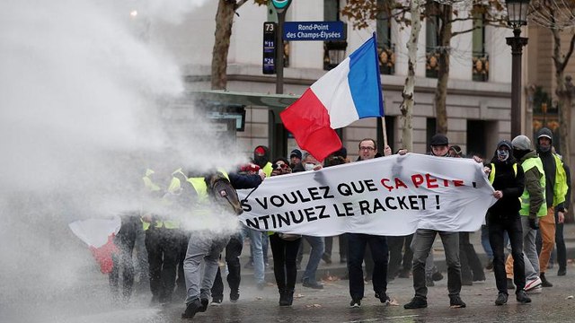 Gilet Gialli: Guerriglia a Parigi