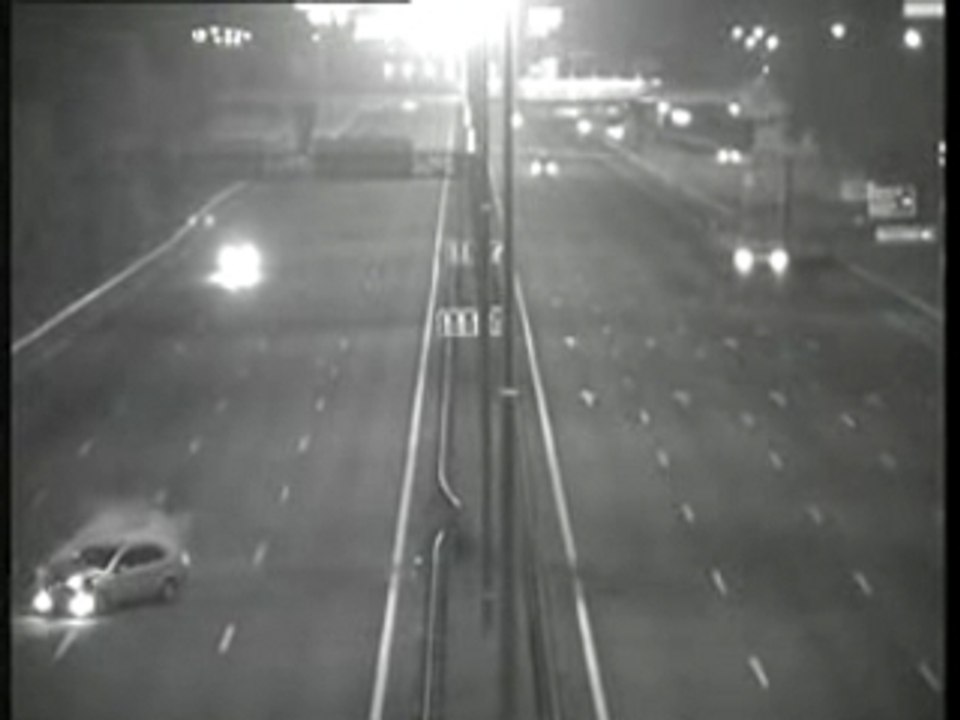 Car vs highway barrier