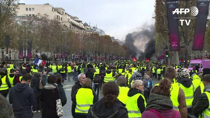 Police use tear gas, water cannon against Paris protesters