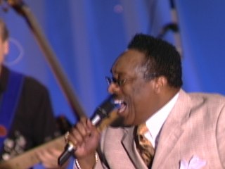 Bill & Gloria Gaither - God Is Standing By