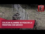 Militares de EU colocan alambre de púas en la frontera con México