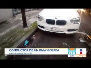 Conductor de BMW golpea a mujer policía | Noticias con Francisco Zea