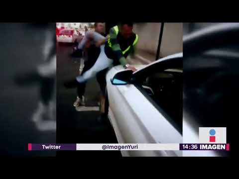Buscan al conductor del BMW que agredió a una policía de tránsito | Noticias con Yuriria Sierra