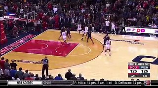 John-Wall-with-a-clutch-block-on-Gordon-to-force-overtime