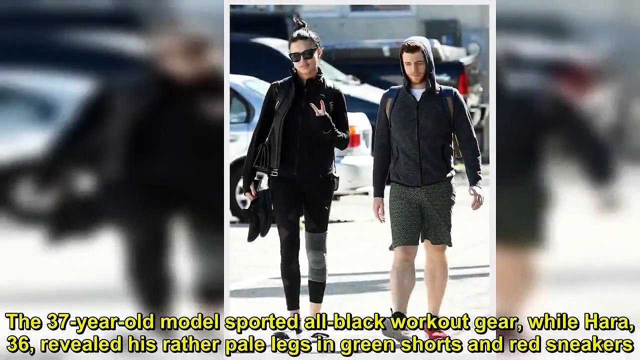 Adriana Lima sports all-black workout gear as she heads to the gym with boyfriend Metin Hara