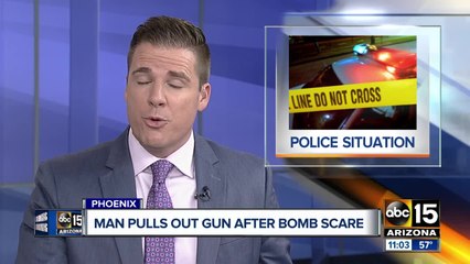 Suspect held at gunpoint by victim amid bomb scare