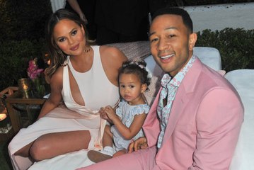 Chrissy Teigen Shares Adorable Video of Daughter Luna Feeding Baby Miles