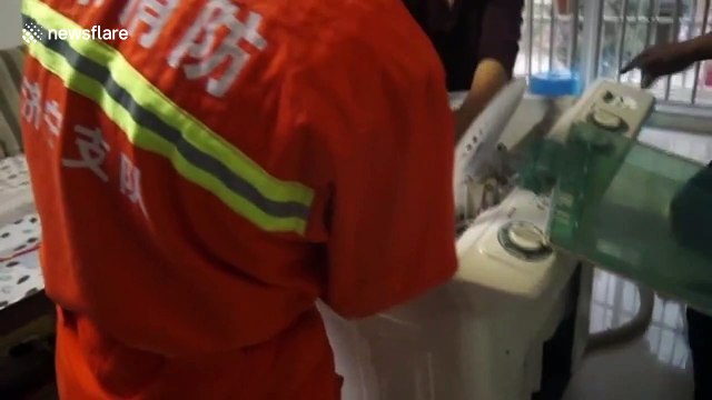 Firefighters rescue boy trapped in washing machine