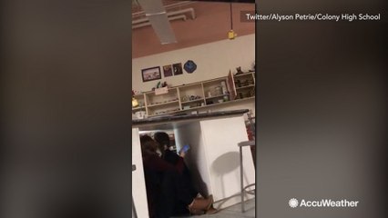 High school students take cover during 7.0 magnitude earthquake