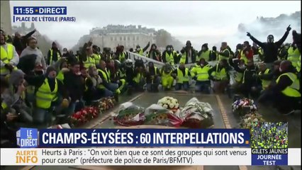 Sous l'Arc de Triomphe, des gilets jaunes encerclent la tombe du soldat inconnu
