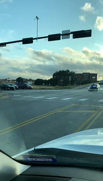 Man Jumps on Hood to Avoid Hit and Run