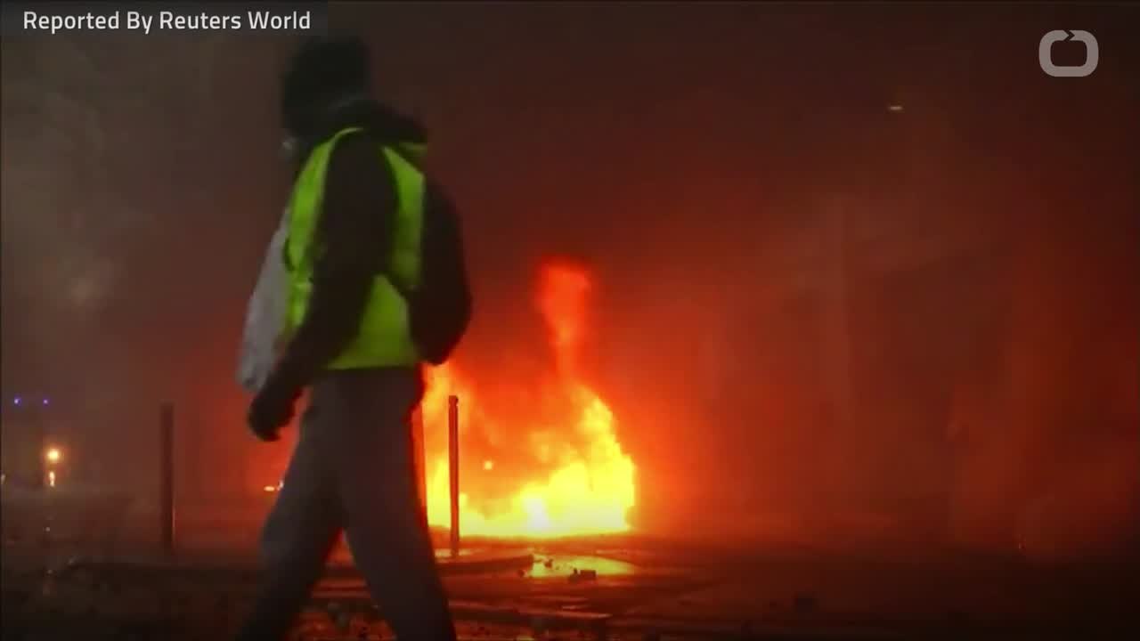 French Riot Police Clash With Protestors In Paris, 300 Arrested, 100 Injured