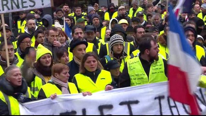 Macron tells PM to hold talks after worst riots in Paris in years