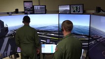 Aircraft carrier flight deck simulator in action