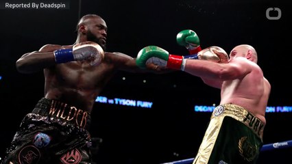 Tyson Fury Gets Off Canvas To Draw Deontay Wilder