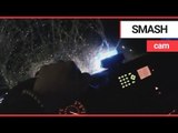 Shocking dashcam captures moment thugs smash police car with sledgehammers | SWNS TV