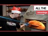 A chef has come up with a festive recipe - pizza topped with a full Christmas dinner | SWNS TV
