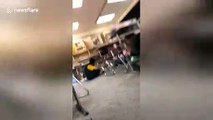 Footage shows the moment students duck under tables as 7.0-magnitude strikes Anchorage, Alaska
