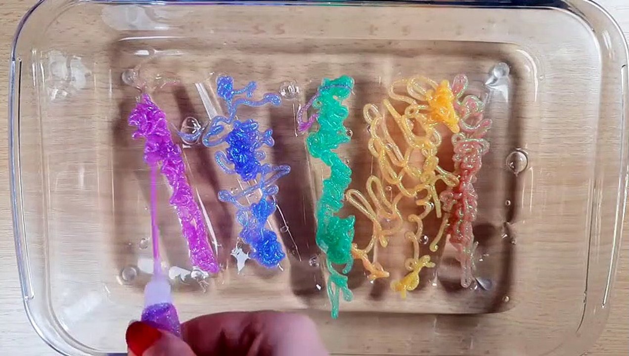 Mixing Glitter Glue into Clear Slime