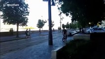 Tram runs over bike in BMX stunt gone wrong