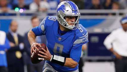 Matthew Stafford pitches a pass for a loss