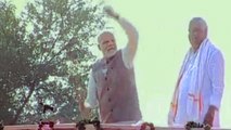 PM Modi plays traditional drum during rally in Rajasthan | OneIndia News