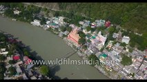Lakshman Jhula bridge at Rishikesh across the Ganges- aerial journey over crowded temple town