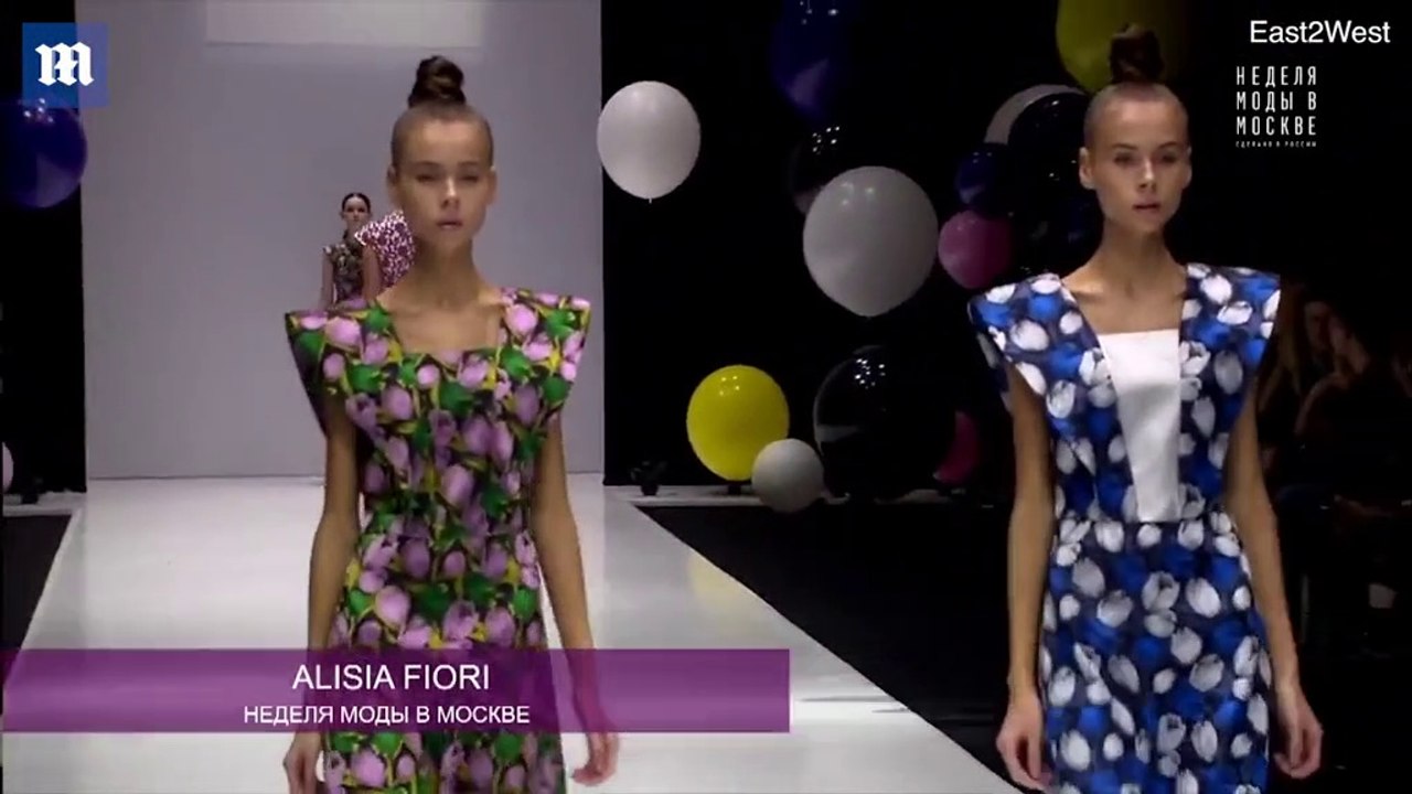 Twin girls walk in Moscow Fashion Week